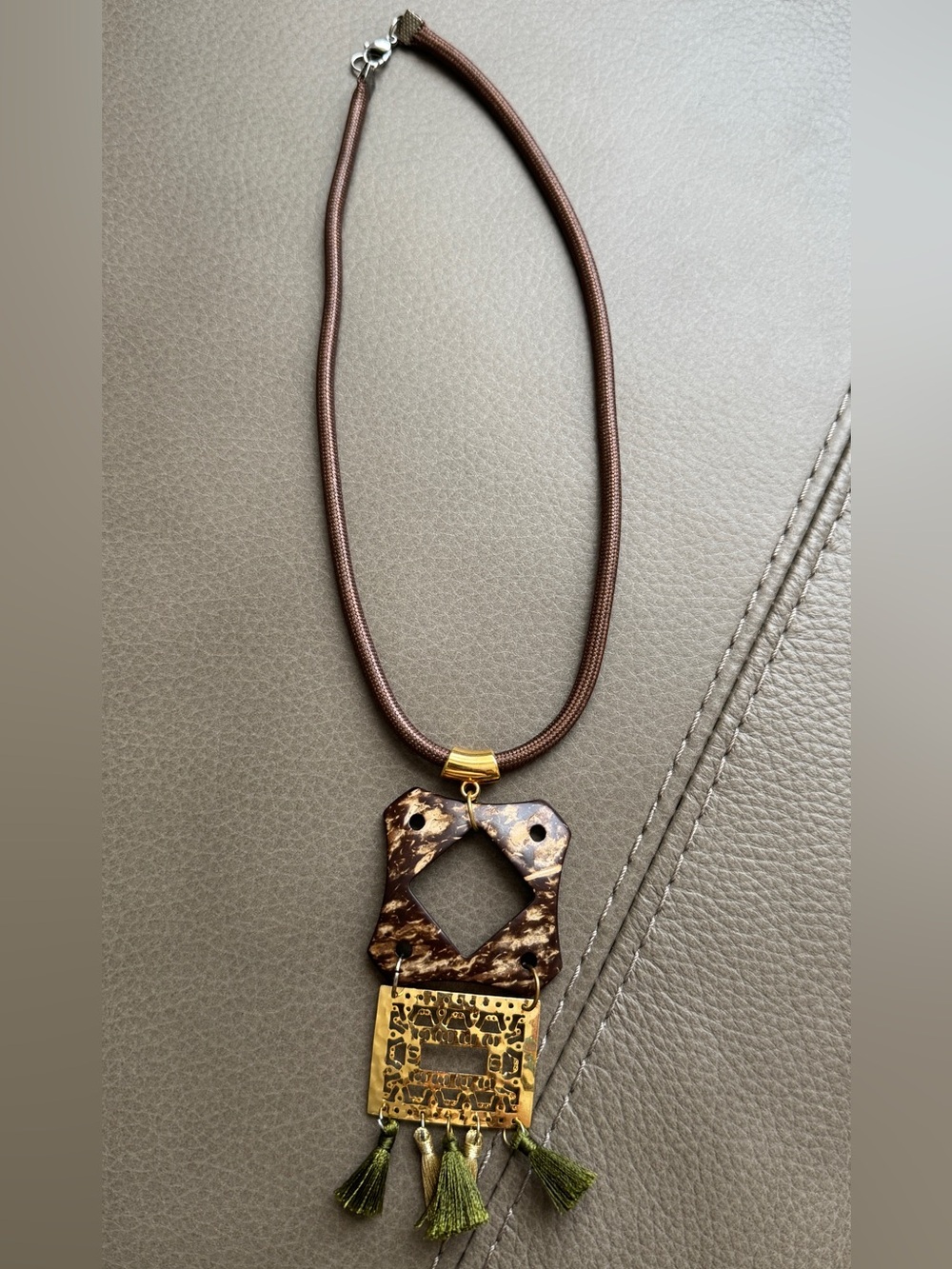 Elegant Brown Tassel Pendant Necklace with Gold Accents
